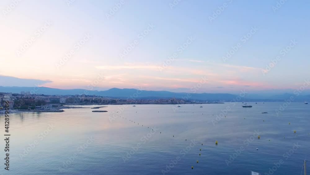Aerial view of Antibes coastal line at dawn, France. Aerial view of Antibes coastal line at dawn, France.