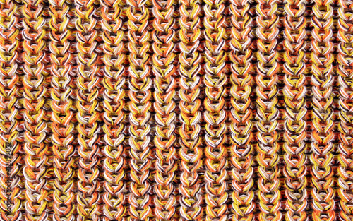 Knitted background. Mustard knitted background