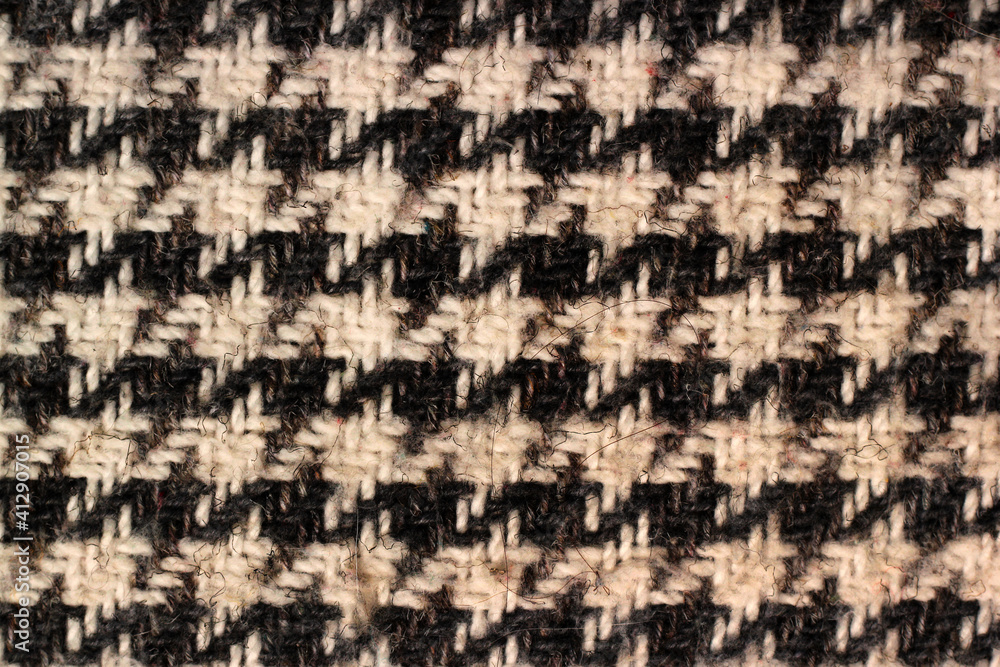 Checkered wool fabric, casual cloth background Checkered wool fabric, casual cloth background
