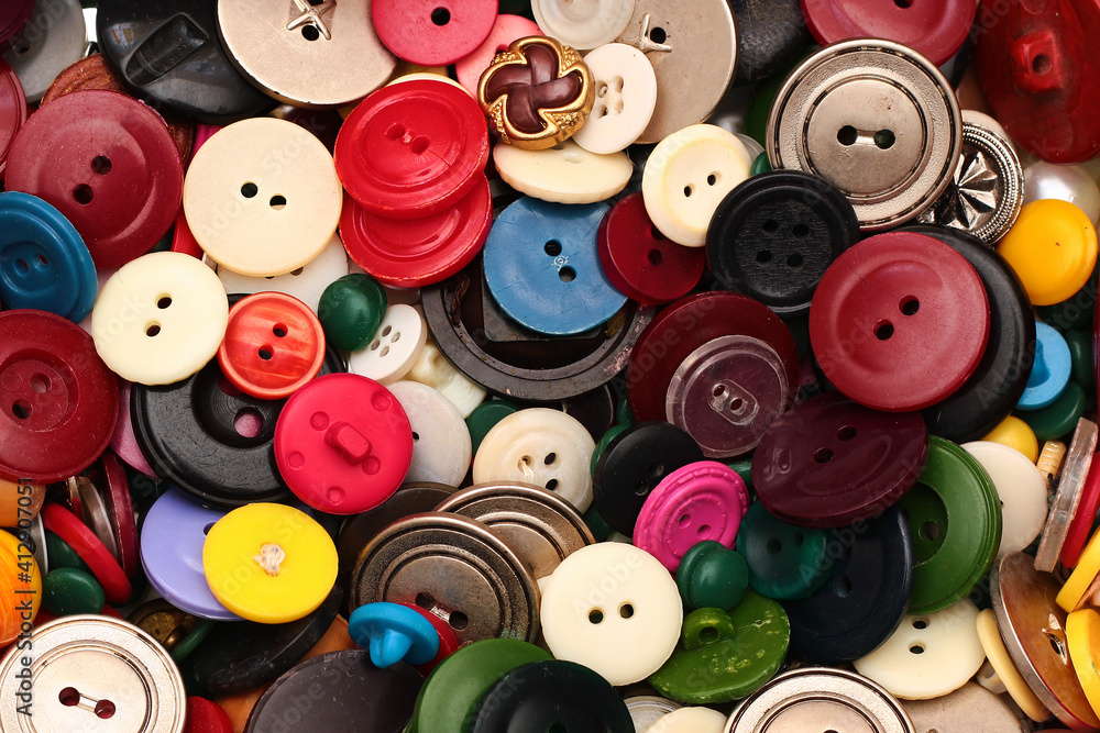 Old plastic sewing buttons as background Old plastic sewing buttons as background