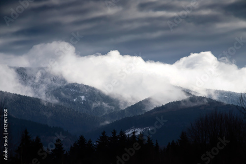 Foggy layered mountain landscape