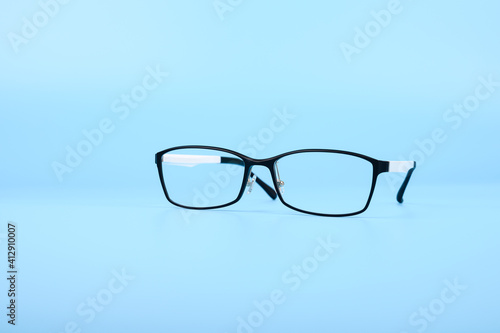 Fashion glasses isolated on blue pastel background...
