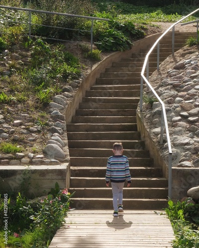child walking in a park