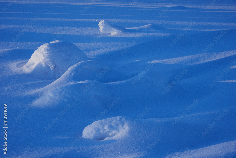 Image from Tjuvåsen Hill, part of the Totenåsen Hills, Norway, a snowy winter evening. Here snow pattern.
