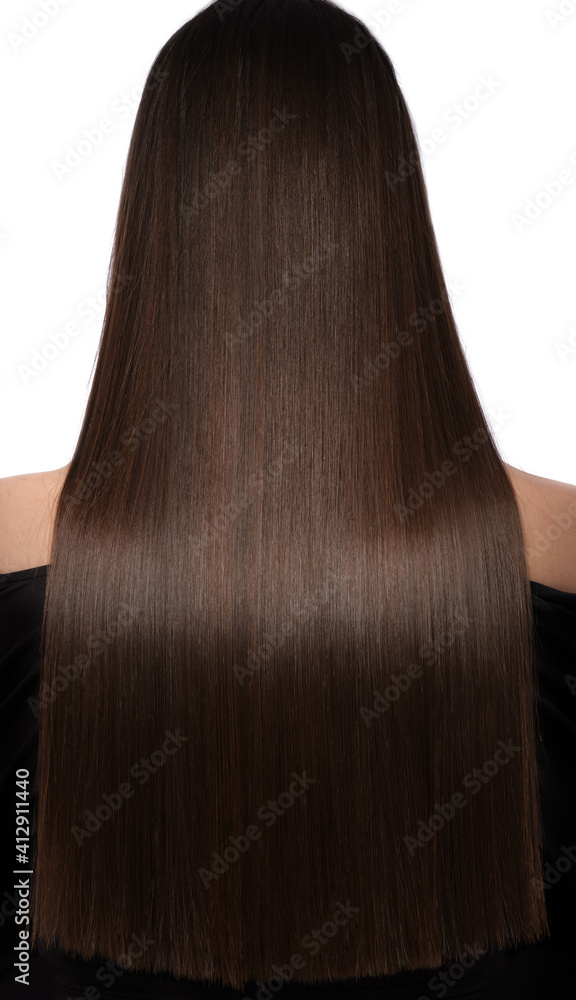 Beautiful brown-haired girl with a perfectly smooth hair. Beauty hair. Beautiful brown-haired girl with a perfectly smooth hair. Beauty hair.