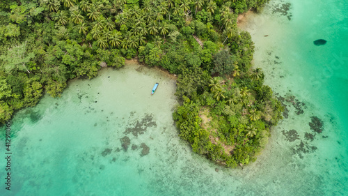 Aerial View Of Triton Bay In Raja Ampat Islands: Lagoon With Turquoise Water And Green Tropical Trees. Wide Angle Nature: Pacific Ocean And Beautiful Landscape In Papua, Indonesia.