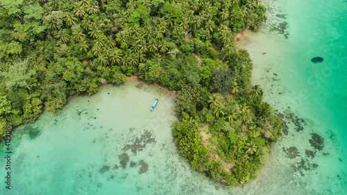 Obraz na płótnie Aerial View Of Triton Bay In Raja Ampat Islands: Lagoon With Turquoise Water And Green Tropical Trees