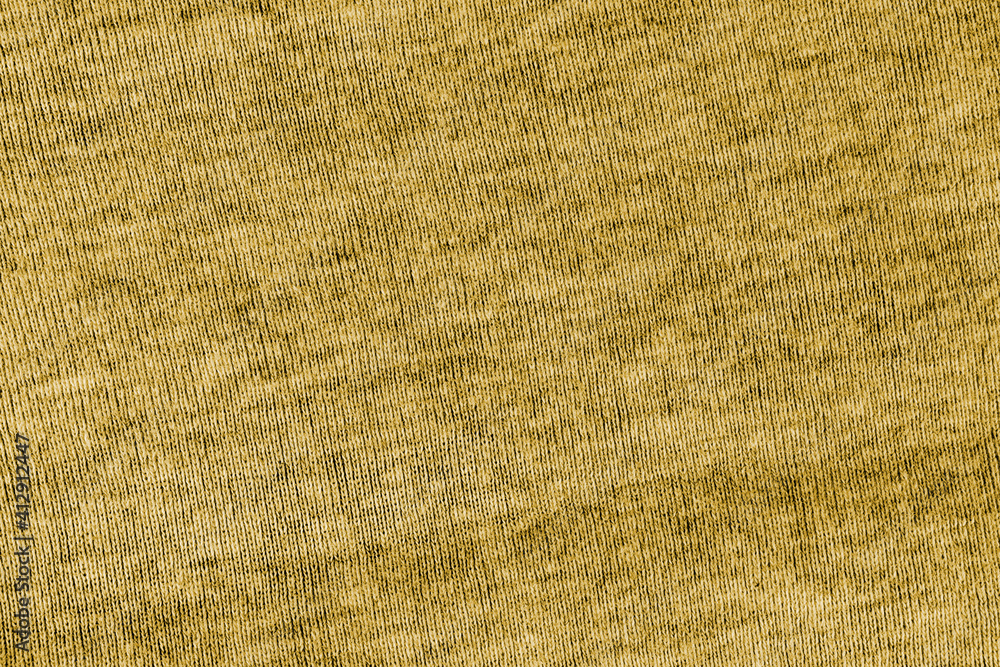 Close up of the yellow-brown macro fabric texture Close up of the yellow-brown macro fabric texture