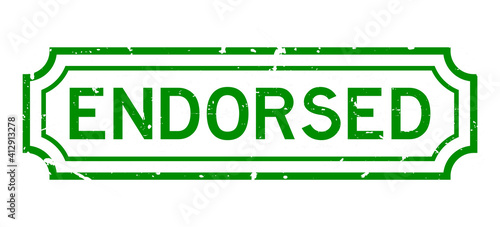 Grunge green endorsed word rubber business seal stamp on white background