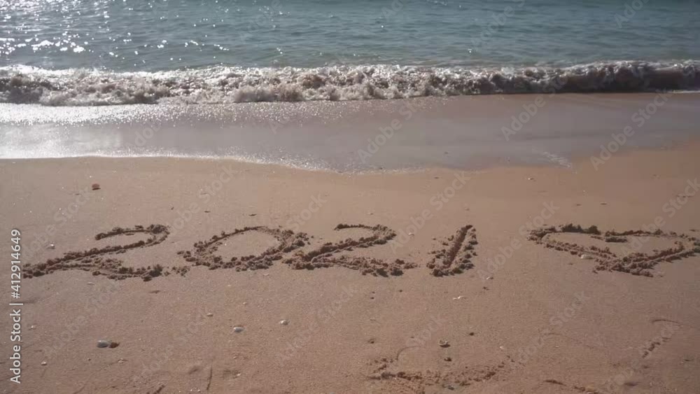 2021 year and romantic love heart sign hand written sandy beach outdoors seascape video clip 2021 year and romantic love heart sign hand written sandy beach outdoors seascape video clip