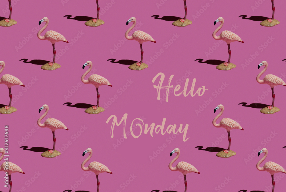 Fototapeta premium Hello Monday - text on pink background and flamingo pattern. Trendy minimal concept.
