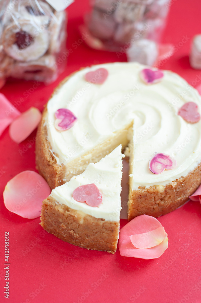 Classic cheesecake on red background Classic cheesecake on red background