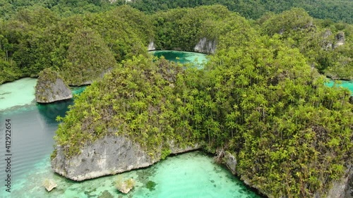 Triton Bay With Turquoise Sea And Green Tropical Trees In Kaimana Islands. Aerial View Of Wide Angle Nature; Pacific Lagoon And Beautiful Landscape In Papua, Indonesia.