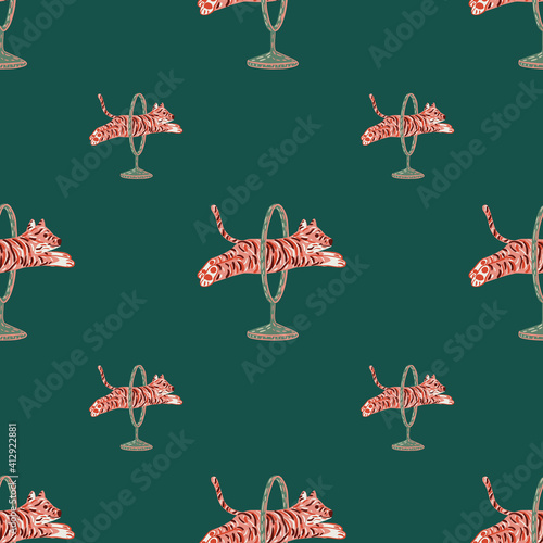 Pink hand drawn tigers seamless circus pattern in kids style. Dark turquoise background. Creative print.