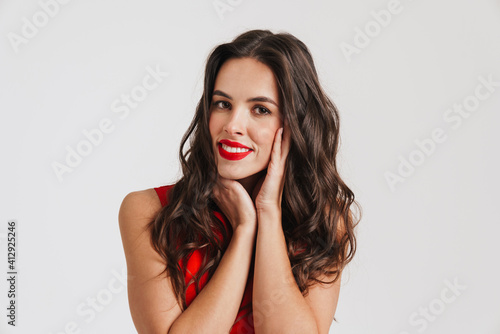 Happy beautiful brunette girl smiling and looking at camera