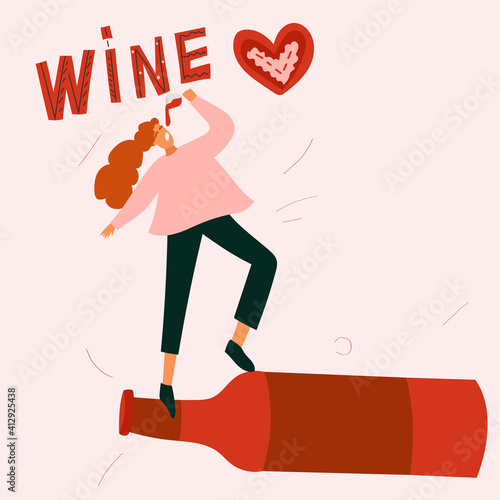 A happy girl drinks a gulp of wine while standing on an empty wine bottle. The word wine written by hand