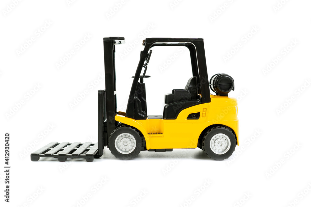 Mini forklift truck on white background. online shopping concept Mini forklift truck on white background. online shopping concept