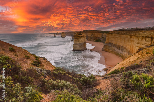 Fototapeta Sunset at the twelve Apostles along the famous Great Ocean Road in Victoria, Aus