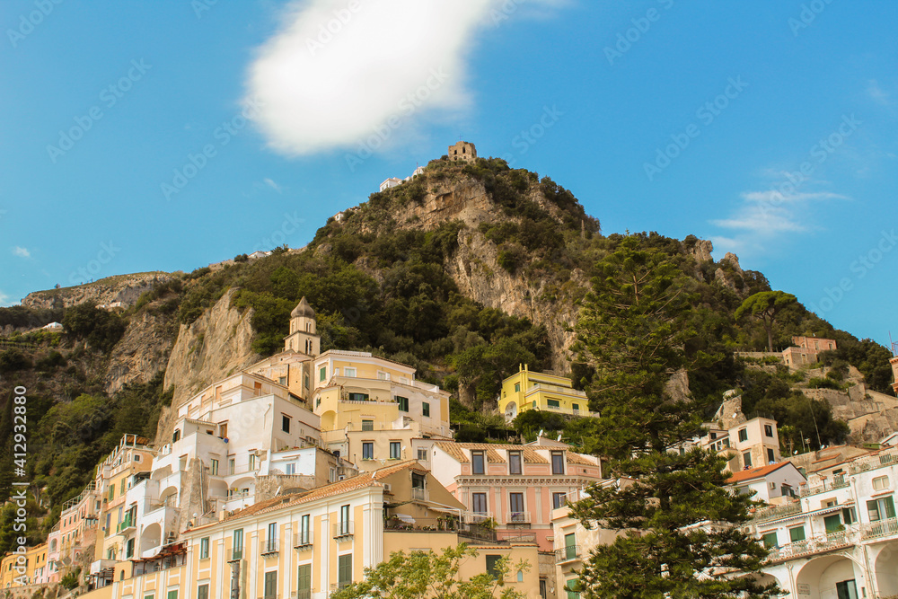 Panoramic view of the city and mountains on the sunny day. Amalfi. Italy.