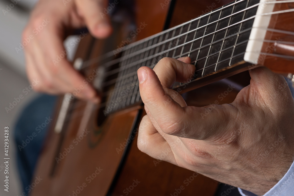 man shows guitar chords. Playing guitar close up man shows guitar chords. Playing guitar close up