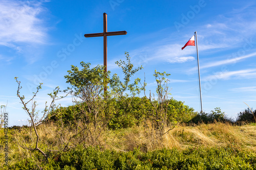 Memorial cross on top of Leskowiec peak in Little Beskids mountains near Andrychow in Lesser Poland photo