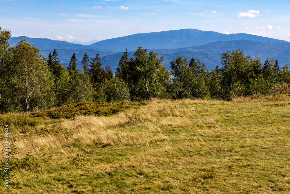 Panoramic view of grassy Leskowiec peak in Little Beskids with Babia Gora peak in southern Beskidy mountains near Andrychów in Lesser Poland Panoramic view of grassy Leskowiec peak in Little Beskids with Babia Gora peak in southern Beskidy mountains near Andrychów in Lesser Poland