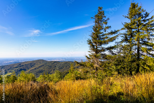 Fototapeta Naklejka Na Ścianę i Meble -  Panoramic view of northern Beskidy mountains with Gancarz peak seen from Leskowiec peak in Little Beskids mountains near Andrychow in Lesser Poland