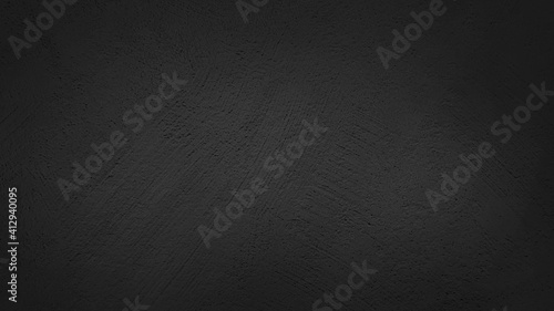 texture of plastered dark black concrete wall.vignette vintage background of natural cement or stucco wall background use as background ,template ,banner ,advertising ,card.