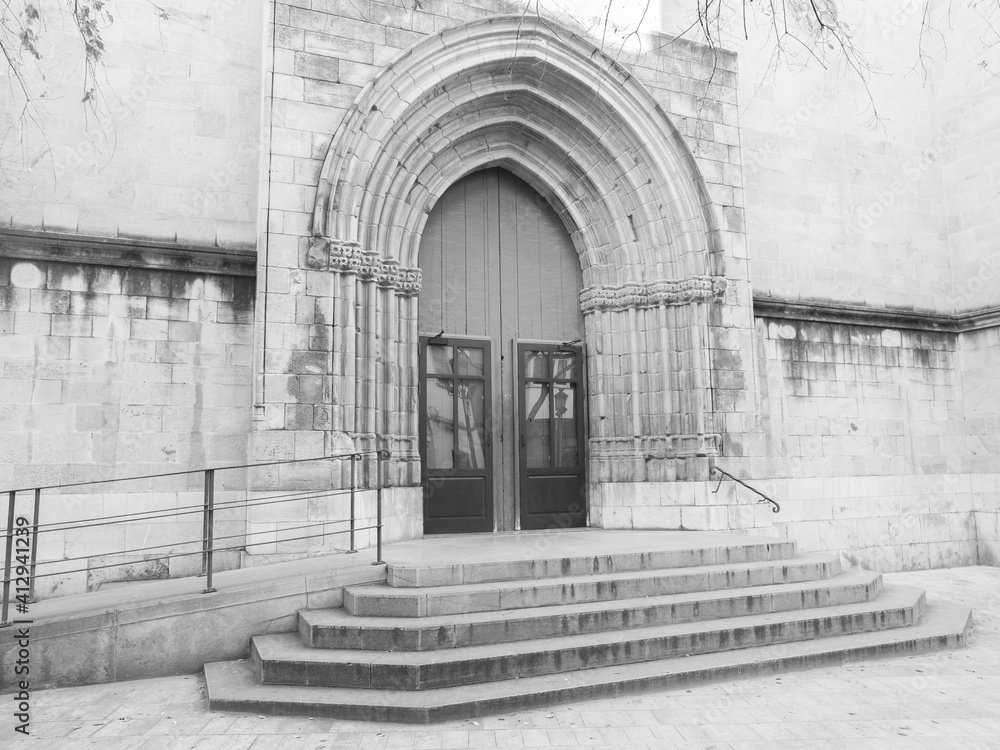 Castellón de la Plana, Valencian Community, Spain (Costa del Azahar). The Co-cathedral of Saint Mary or the Church of Santa Maria la Mayor (Concatedral de Santa María) front door. Castellón de la Plana, Valencian Community, Spain (Costa del Azahar). The Co-cathedral of Saint Mary or the Church of Santa Maria la Mayor (Concatedral de Santa María) front door.