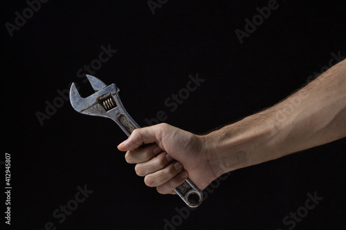 Bild auf Leinwand Adjustable wrench on a black background