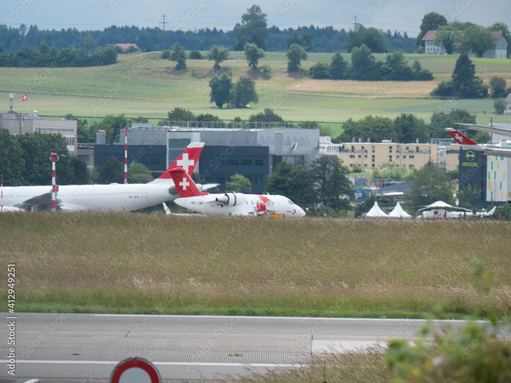 Busy Day at Zurich Airport: Airplanes Taking Off, Landing, and Taxiing ...
