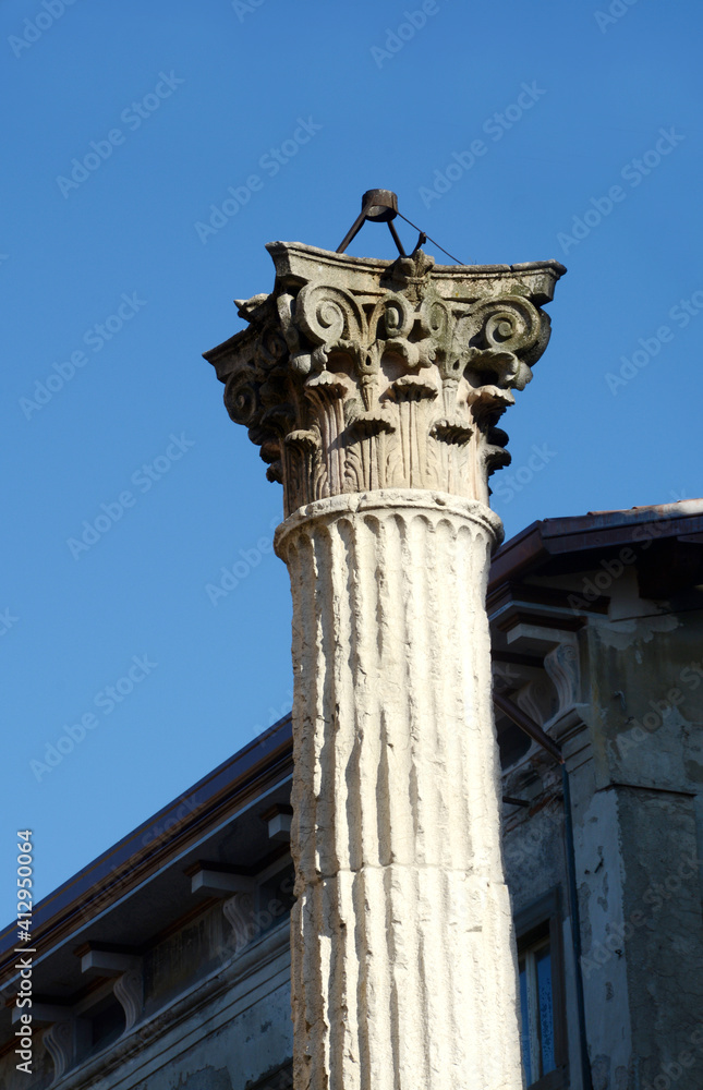 The Corinthian column of ordien del Crotacio place of martyrdom of Saint Alexander in the churchyard of the Basilica of Saint Alexander in Colonna in Bergamo lower town.