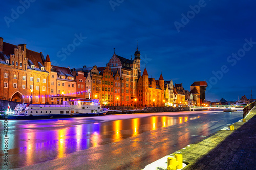 Old town of Gdansk over Motlawa river at snowy dawn. Poland © Patryk Kosmider