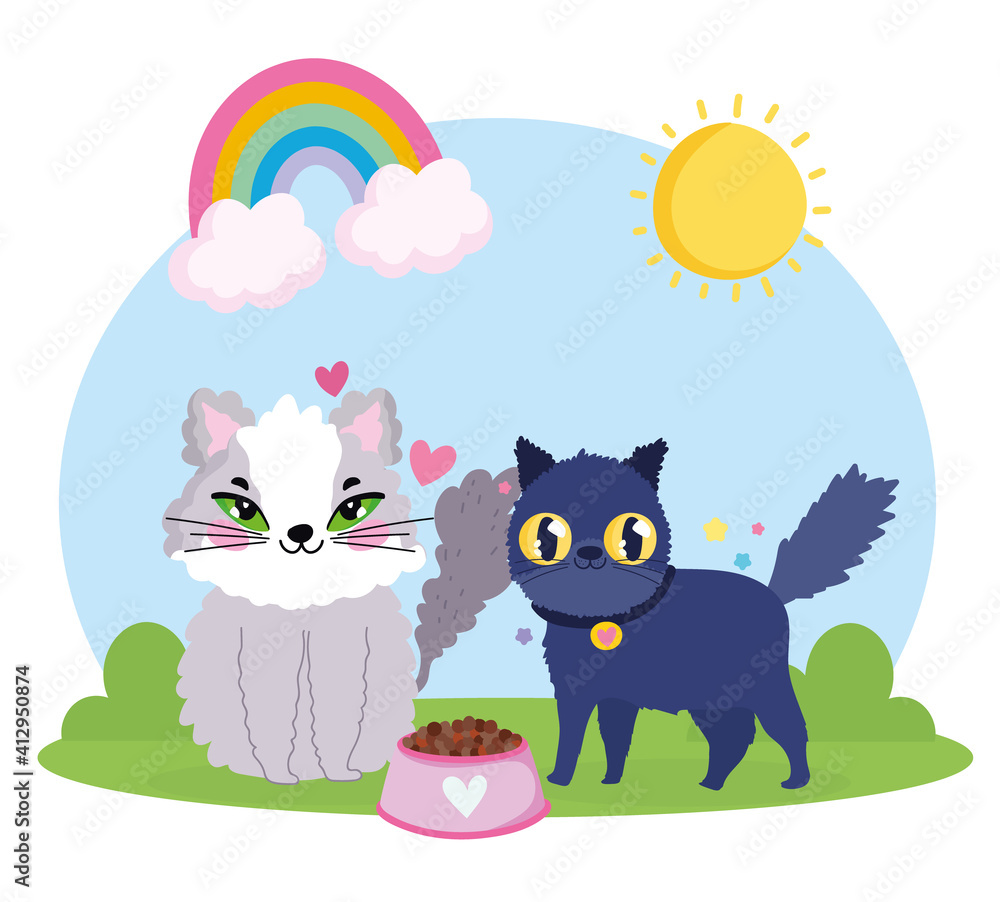 adorable cats with food rainbow in the grass