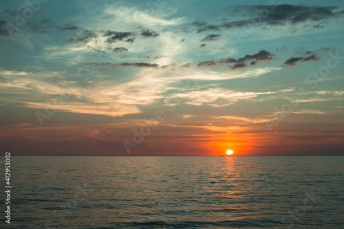 Beautiful sunset over a calm ocean.