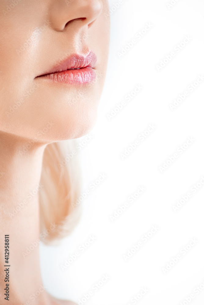macro photo of pink lips of an adult well-groomed woman with a long neck on a white background macro photo of pink lips of an adult well-groomed woman with a long neck on a white background