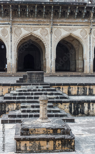 Vijayapura, Karnataka, India - November 8, 2013: Ibrahim Rauza mosque facade with dry pool with steps between mosque and mausoleum. photo