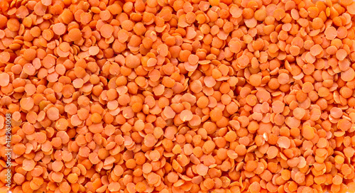 A spread of red lentils as a background