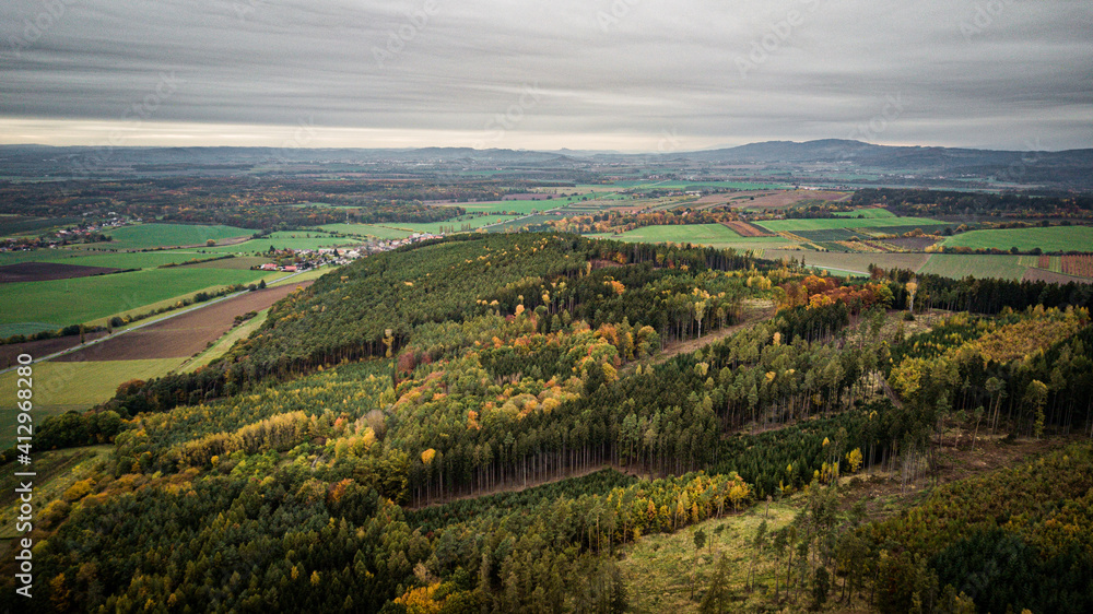 aerial view of country with forest
