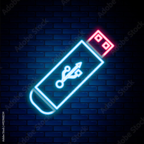 Glowing neon line USB flash drive icon isolated on brick wall background. Colorful outline concept. Vector.