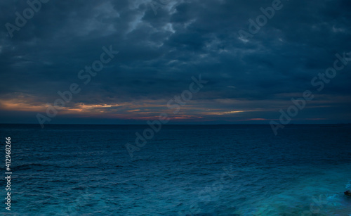 sunset over the sea © Marios Pisis
