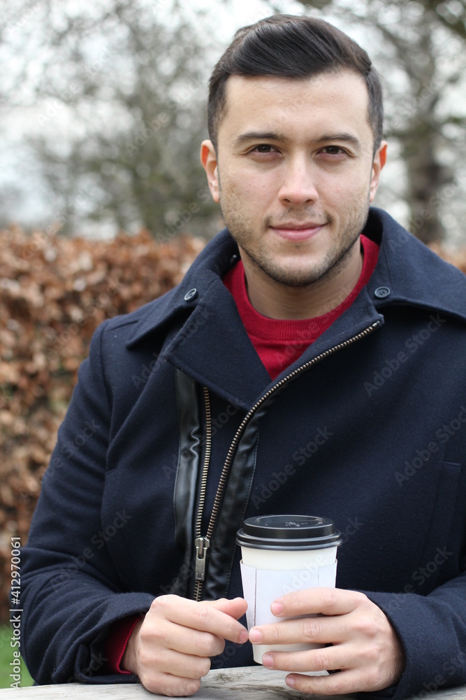 Hispanic businessman during coffee break in autumn Hispanic businessman during coffee break in autumn