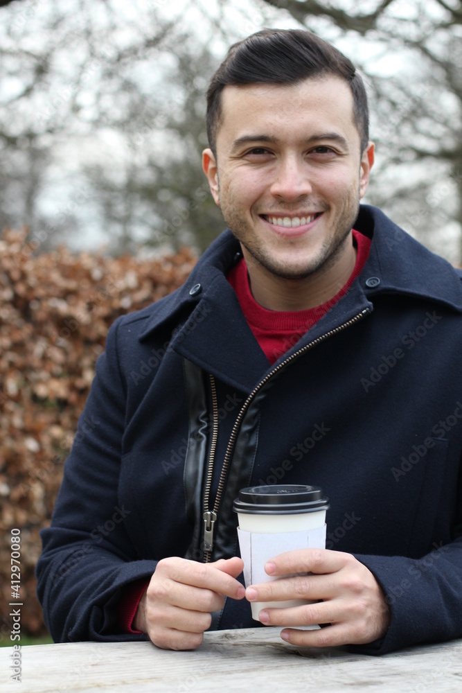 Hispanic businessman during coffee break in autumn Hispanic businessman during coffee break in autumn