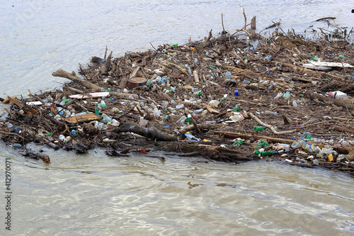 accumulated garbage and plastic waste on the river in Belgrade