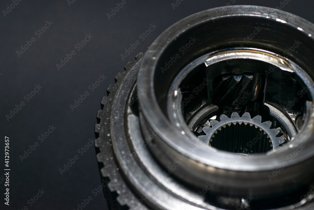 Planetary gear close up on dark background Planetary gear close up on dark background