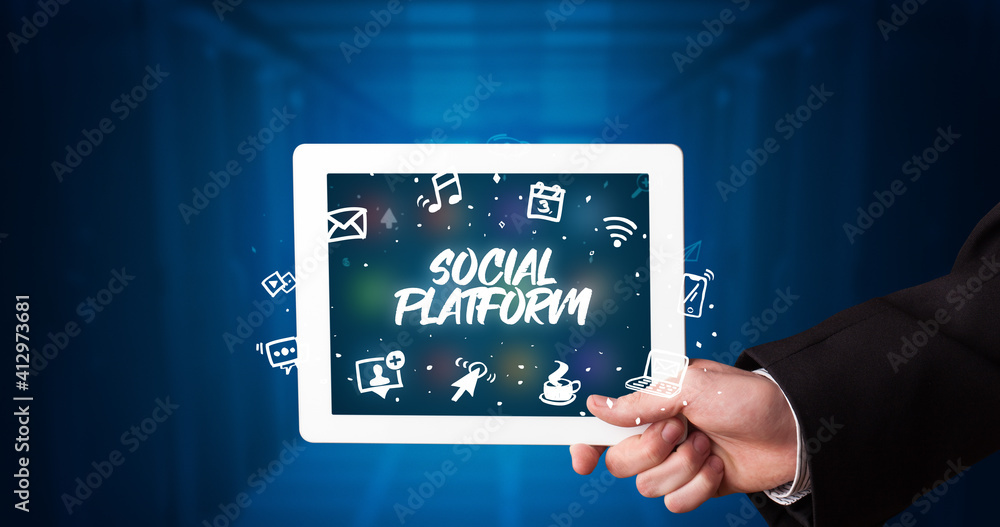 Young business person working on tablet and shows the inscription: SOCIAL PLATFORM Young business person working on tablet and shows the inscription: SOCIAL PLATFORM