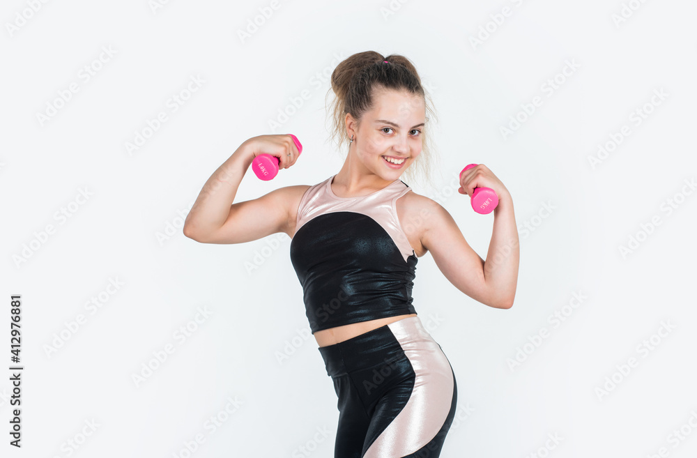 teen girl training with barbells. sport and success. healthy lifestyle. concept of fitness. teen girl training with barbells. sport and success. healthy lifestyle. concept of fitness.