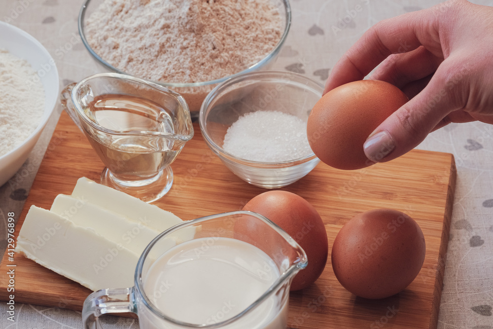 Preparing ingredients for homemade pancakes. Cooking for someone special concept Preparing ingredients for homemade pancakes. Cooking for someone special concept