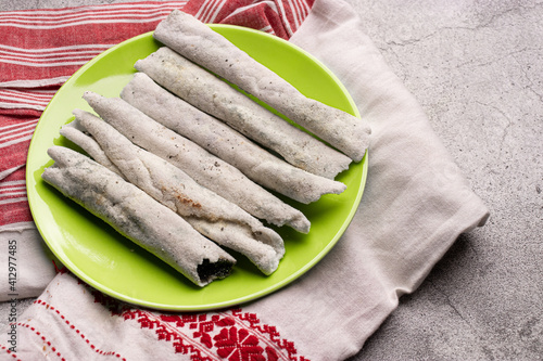 Til pitha a traditional food of Assam  isolated stock image. photo