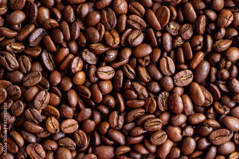 Roasted coffee beans background. Close up Roasted coffee beans background. Close up